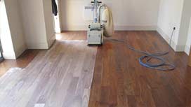 Sanding hardwood floor with Bona equipment | {COMPANY_NAME}